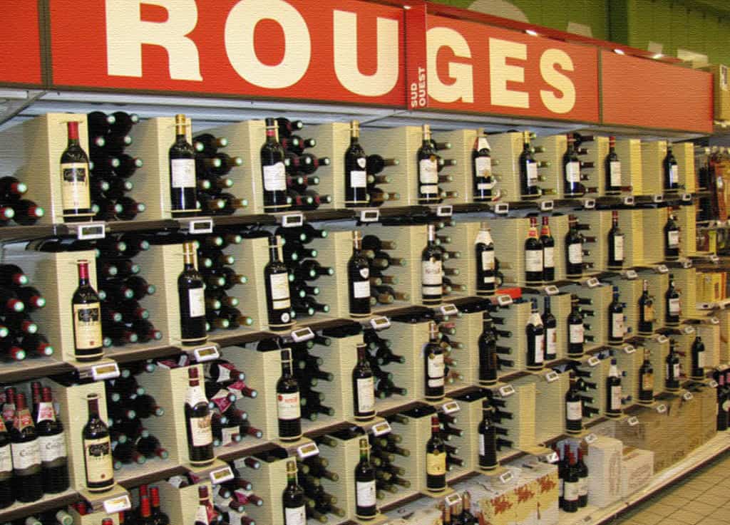 wine-on-shelf-in-french-grocery-store